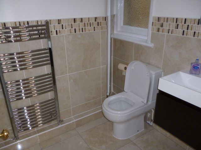 Completed bathroom &ndash; full tiling and sanitary ware